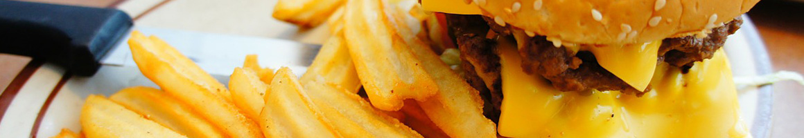 Eating Burger at K & C Burkie restaurant in Lakewood, WA.